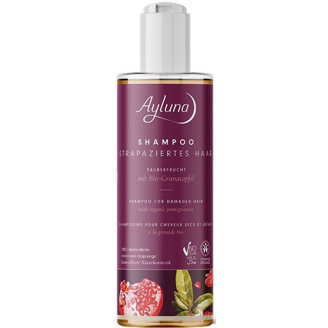 Aluna Shampoo for Damaged Hair with organic npomegranate in a plastic bottle with a push down cap