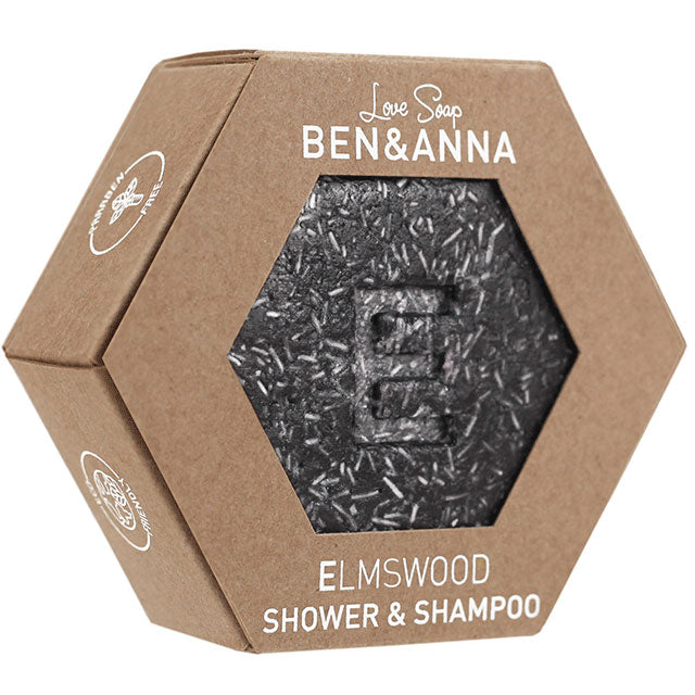 Ben and Anna Love Soap Elmswood Shower and Shampoo Solid Bar Soap with an E stamped in the middle of the black speckled with white bar soap. In a hexagonal cut out front box