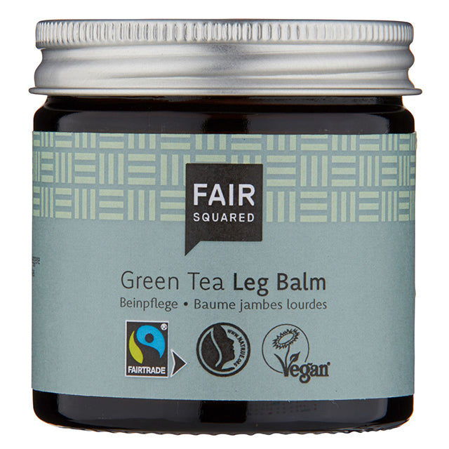 Fair Squared Green Tea Leg Balm with fair trade ingredients, suitable for vegans . In a brown glass jar with a screw top lid.