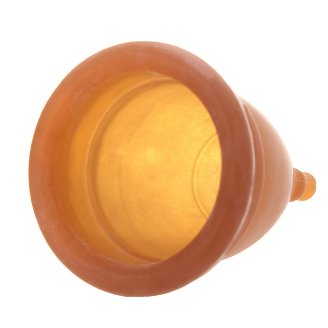 Fair Squared Natural Period Cup made of 100% Natural Rubber is on its side.