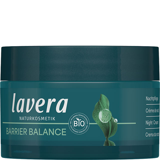Lavera Barrier Balance Night Cream with prebiotics and organic green tea in a dark mgreen glass jar made with a minimum of 30% used glass