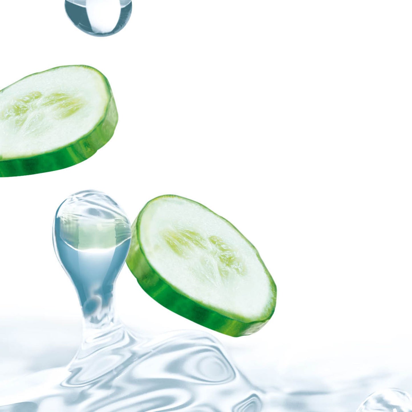 Two fresh cucumber slices floating above clear water droplets and a rippling water surface on a white background.