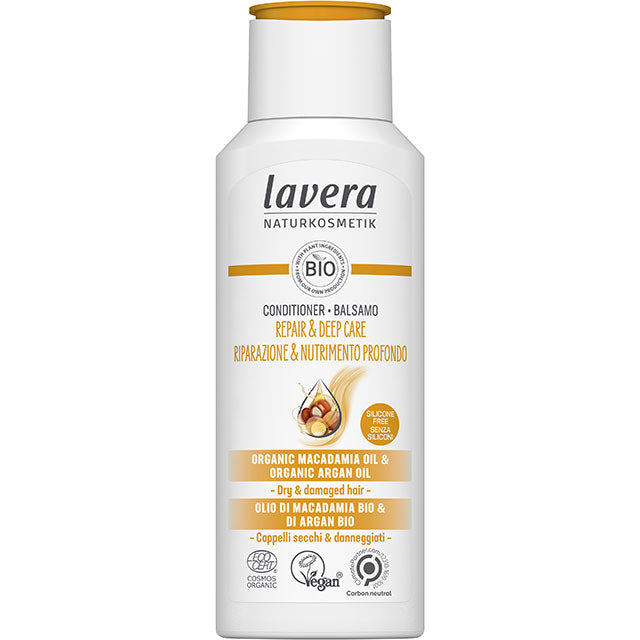 Lavera Repair and Deep Care Conditioner with organic macadamia and organic argan oil is in a white plastic bottle with a flip top lid.