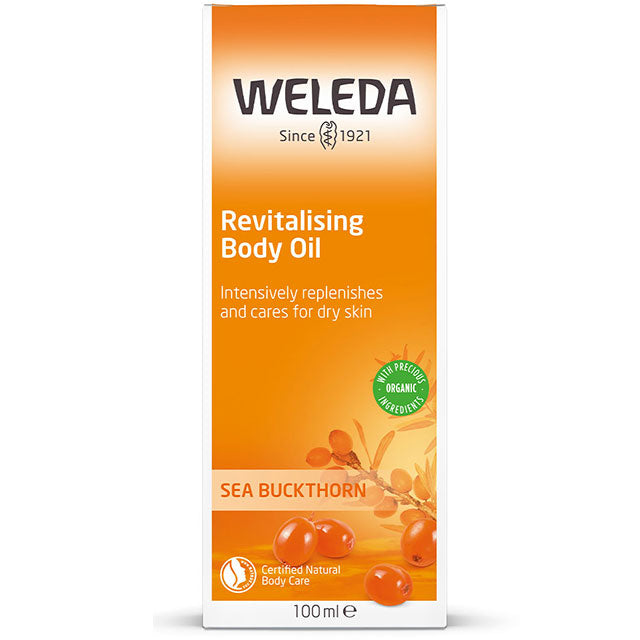 Weleda Revitalising Body Oil Sea Buckthorn Box with a glass bottle with pump lid inside.
