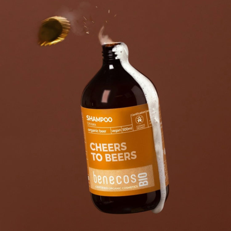 benecos BIO organic beer shampoo for unisex hair care. A 500ml bottle of vegan, COSMOS Organic certified shampoo with a playful "Cheers to Beers" label and realistic beer-style foam.