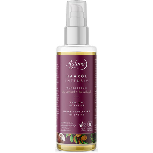 Ayluna Wondertree Intensive Hair Oil is in a plastic bottle with a pump lid  and a cap over the pump. 