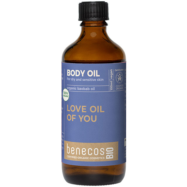 Benecos Bio Body Oil Organic Baobab Oil in a brown glass bottle with a blue label and a screw top lid.