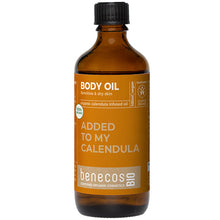 Benecos Bio Body Oil withj Organic Calendula in a brown glass bottle with a screw top lid.