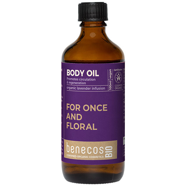benecos Bio Body Oil with an organic lavender infusion in a glass brown bottle with a screw top lid and a purple label 