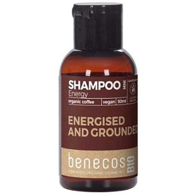 Benecos Bio Energy Shampoo with organic coffee in a small brown bottle with a flip top lid