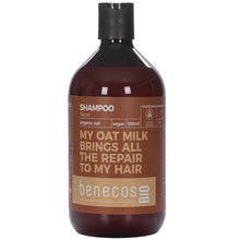 Benecos Bio Organic Oat Repair Shampoo in a brown bottle with a flip top lid. 