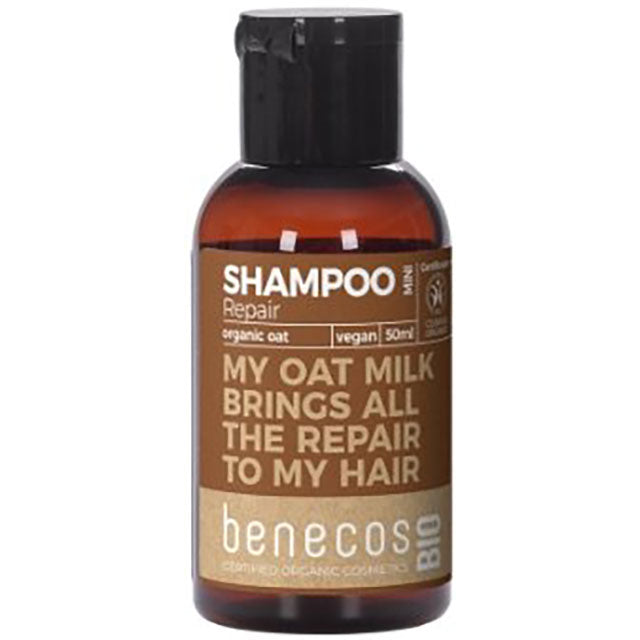 Benecos Bio Repair Shampoo with organic oat mini in a small brown bottle with a flip top lid.