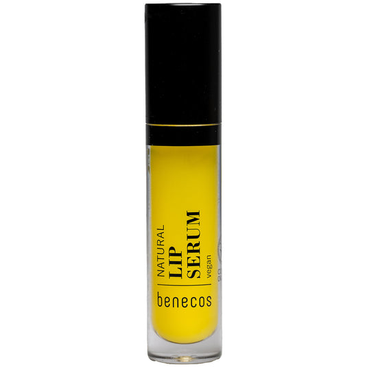 Benecos Natural Lip Serum in a tube with a black lid, showing the yellow lip serum on a white background