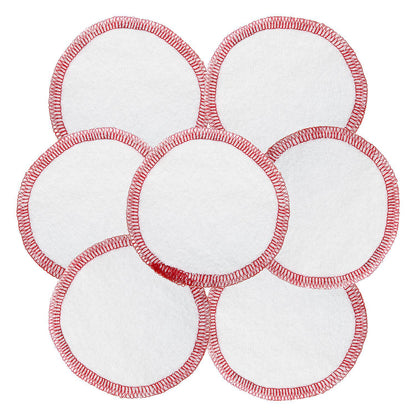 Fair Squared Cosmetics Pads are white round pads with red stitching on a white background.