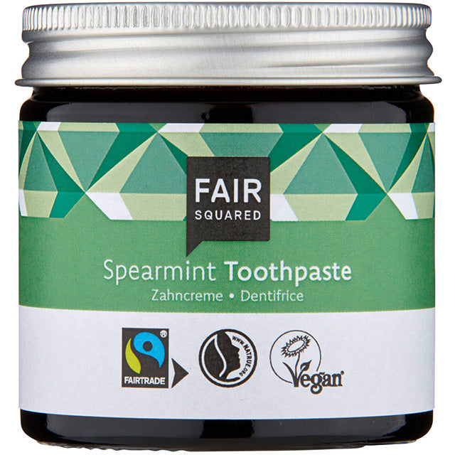 Fair Squared Spearmint Toothpaste with fair trade ingredients in a brown glass jar with a screw top lid. 