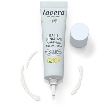 Lavera Basis Sensitive Anti Ageing Eye Cream in an open tube and white cream on a white background