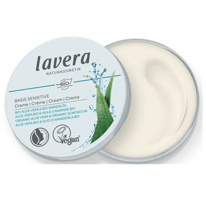 Lavera Basis Sensitive Cream Mini Organic Moisturiser in a tin with open lid  showing the cream 