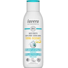lavera Basis Sensitiv Firming Body Lotion with organic aoe vera and natural coenzyme Q10 for normal skin is in a whitle bottle with and blue label and blue flip top. 
