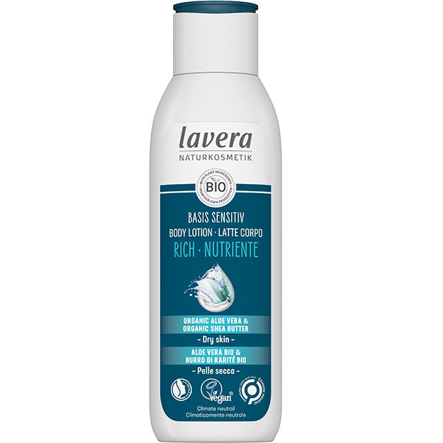 Lavera Basis Sensitive Rich Body Lotion with organic aloe vera and organic shea butter in a plastic bottle with a dark blue label.
