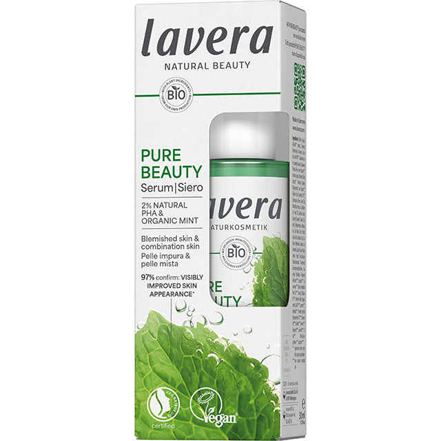 Lavera Pure Beauty Serum is in a bottle with a pipette dropper in a carboard box with a leaf design on a white background