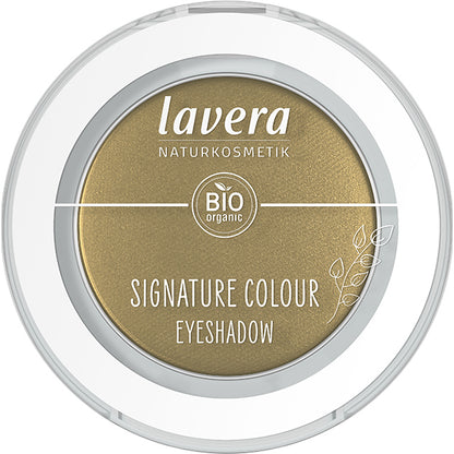 Lavera Signature Colour Eyeshadow Dazzing Gold is in a white pressed powder compact with a clear lid on a white background 
