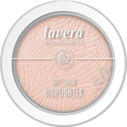 Lavera Soft Glow Highlighter Aurora Glow 02 is in a white pressed powder compact with a clear lid, on a white background
