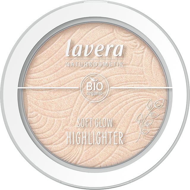 Lavera Soft Glow Highlighter Champagne Shimmer 01 is in a white pressed powder compact with a clear lid, on a white background.