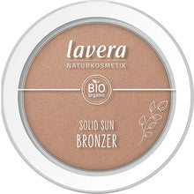 Lavera Solid Sun Bronzer Soleil Kiss 01 is in a white compact with a see -through lid on a white background