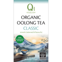 Qi Organic Oolong Tea Classic Tea Bags is in a box showing a picture of a mountain and a cup of tea on a white background