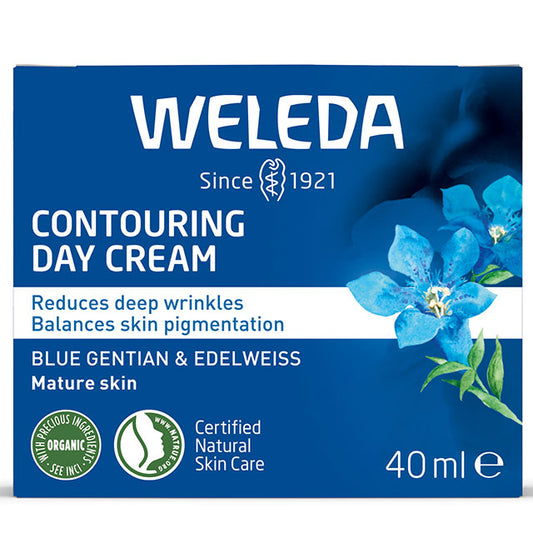 Weleda Contouring Day Cream is in a blue and white box with blue flowers on a white background 