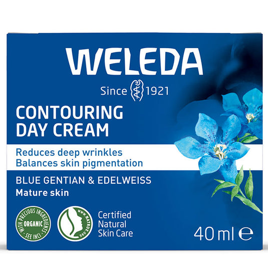 Weleda Contouring Day Cream is in a blue and white box with blue flowers on a white background 
