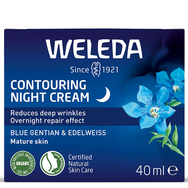 Weleda Contouring Night Cream is packaged in a blue and white cardboard box with blue flowers on a white background