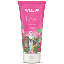 Weleda Love Shower Cream is in a pink tube with a floral design on the front on a white background.