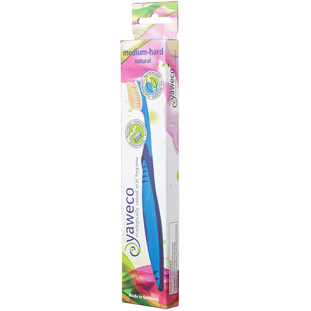 Yaweco Biobased Toothbrush Medium Hard Natural Bristle in a cardboard box. 