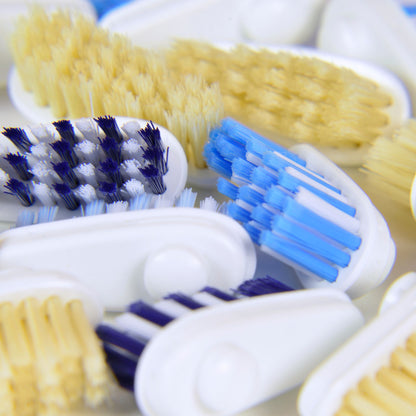 Close-up of Yaweco bio-based replaceable toothbrush heads natural and nylon