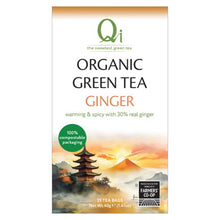 Qi Organic Green Tea Ginger packaging with a scenic design on a white background
