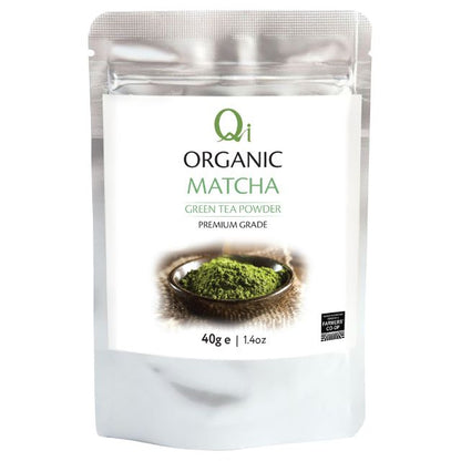 Packaging of Qi Organic Matcha green tea powder on a white background