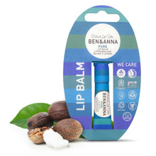 Ben & Anna Pure Lip Balm in a blue tube, presented in its original blue and green striped cardboard packaging. The packaging is displayed on a white background alongside natural ingredients (shea butter a green leaf, and white coconut oil).