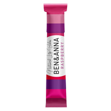 A single stick of Ben & Anna Natural Lip Balm Raspberry, shown vertically on a plain white background. The packaging features a white centered label with black and pink text, vibrant pink and purple bands.