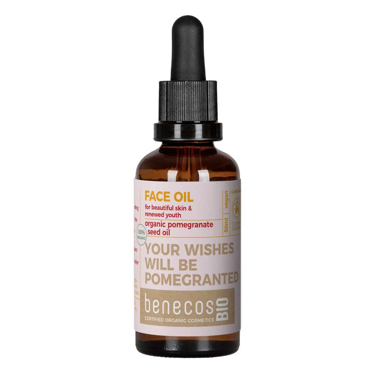 A bottle of Benecos Bio Organic Pomegranate Seed Face Oil on a plain white background. The product is in an amber glass bottle with a black dropper cap and a beige label featuring orange and brown text.