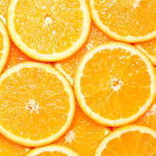 Close-up of sliced oranges arranged in a pattern