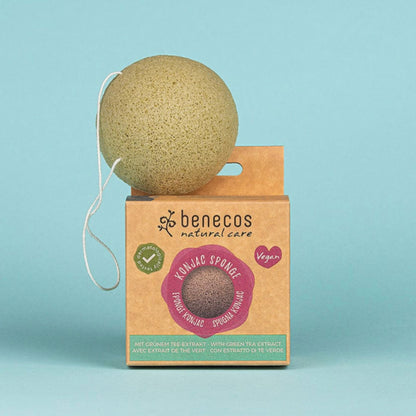 Benecos Konjac Sponge Green Tea is in a biodegradable box on a blue background.