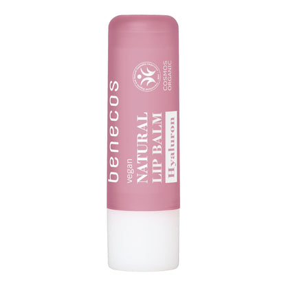 A single stick of Benecos vegan Natural Lip Balm with Hyaluron, featuring a dusty pink upper body and a white cap, set against a plain white background.