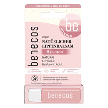 Benecos Natural Lip Balm Hyaluron is packed in a blister pack with a pink a white design on a white background.