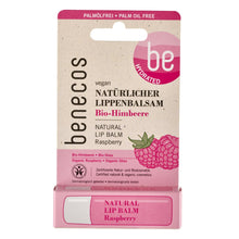 Benecos Natural Lip Balm Raspberry with organic shea and organic raspberry.  The lip balm is wrapped in a blister pack set on a white background. 