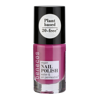 plum colour nail polish bottle with black cap on a white background