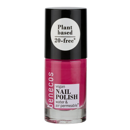 Benecos vegan nail polish bottle with pink polish and black cap on a white background
