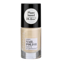 Vegan nail polish bottle with black cap and white label on a white background