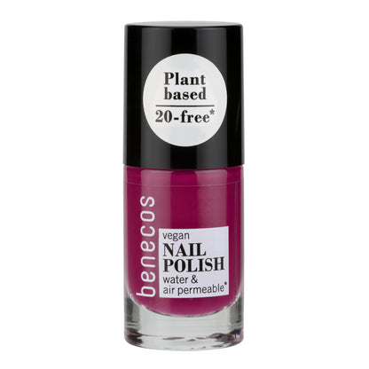 Benecos vegan nail polish bottle with black cap and pinkish-red color on a white background