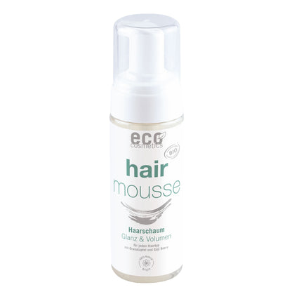 Hair mousse bottle with eco cosmetics branding on a white background